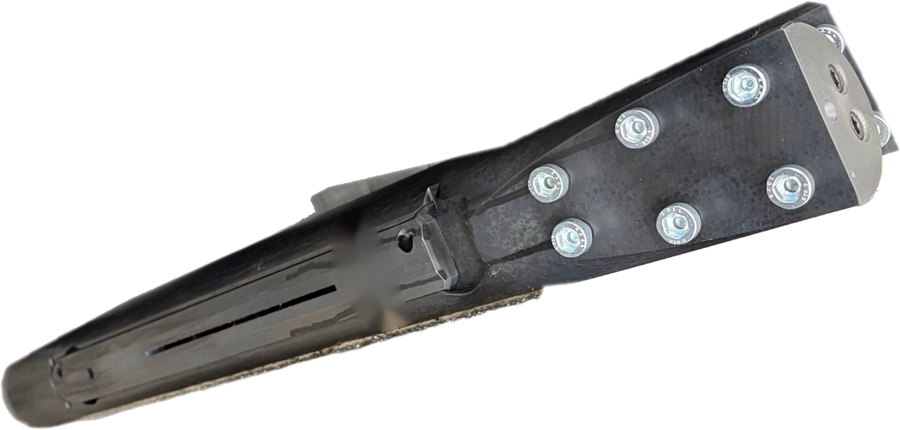 Black side-load beacon housing with a bolted bit face and a hard-faced wear strip
